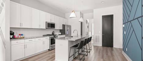 Fridge, microwave, dishwasher, coffee/tea maker