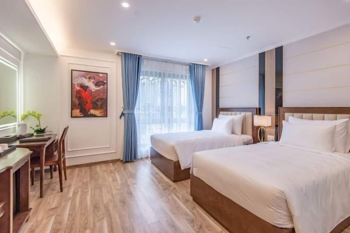 Memory-foam beds, minibar, in-room safe, desk