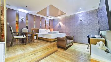 Quarto casal com design assinado, sauna seca, vista para o parque | Vista do quarto