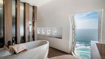 Exclusive Villa, 2 Bedrooms, Ocean View | Bathroom | Combined shower/tub, rainfall showerhead, free toiletries, hair dryer