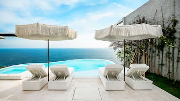 Outdoor pool, pool umbrellas, pool loungers