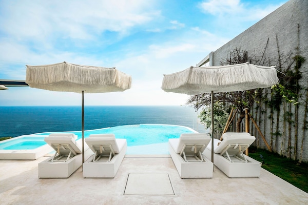 Outdoor pool, pool umbrellas, pool loungers