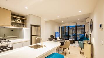 2 Bedroom 2 Bathroom Premier Apartments | Living area | 55-inch Smart TV with digital channels, TV