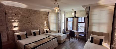 Comfort Quadruple Room | Premium bedding, Select Comfort beds, in-room safe, desk