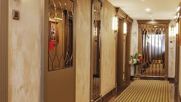 Premium bedding, down comforters, minibar, in-room safe