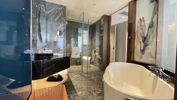 Design Room, 1 King Bed | Bathroom | Rainfall showerhead, free toiletries, hair dryer, bathrobes