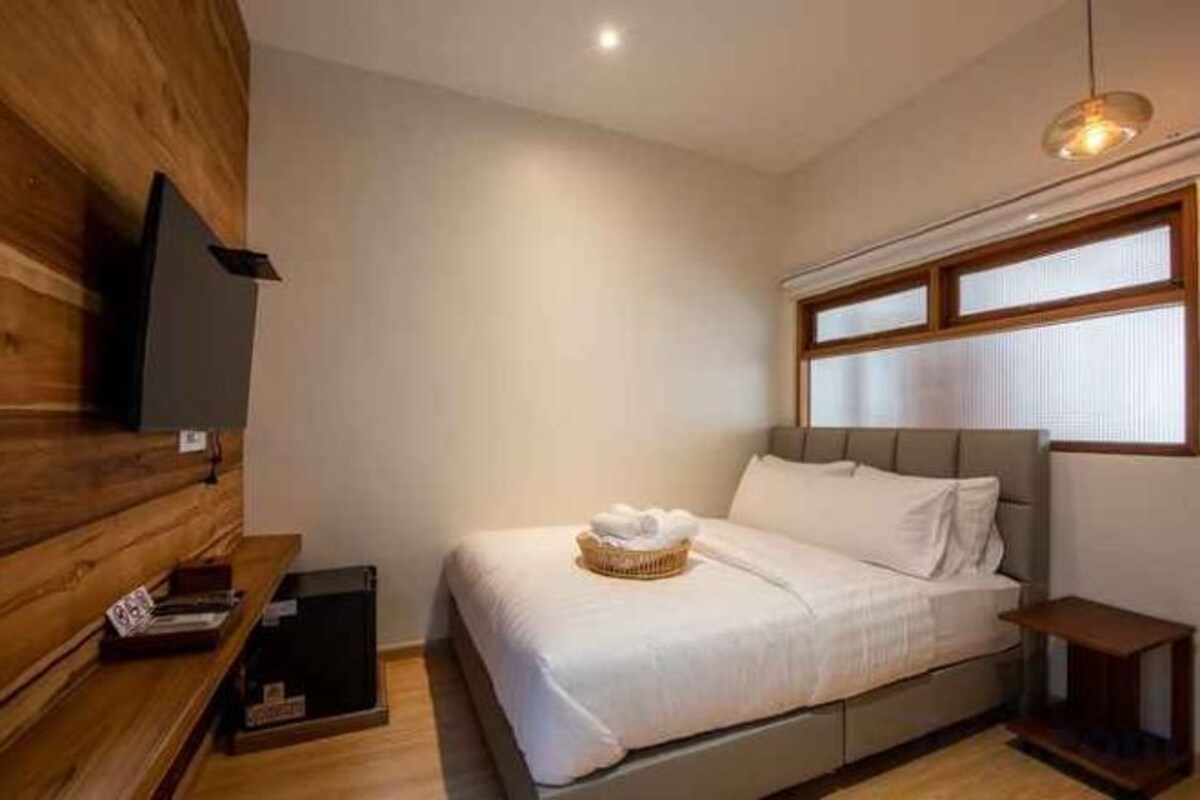 Premium bedding, blackout curtains, free WiFi, bed sheets