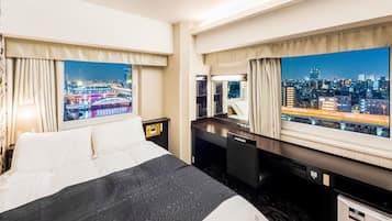 Down duvets, desk, laptop workspace, blackout curtains