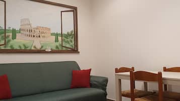 City-Apartment | Wohnbereich | 32-Zoll-Flachbildfernseher mit Kabelempfang, Fernseher