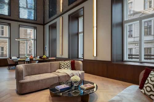 Presidential Studio Suite | Living area | 55-inch Smart TV with digital channels, TV, heated floors