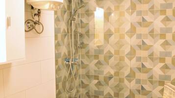 Bathtub, hair dryer, towels