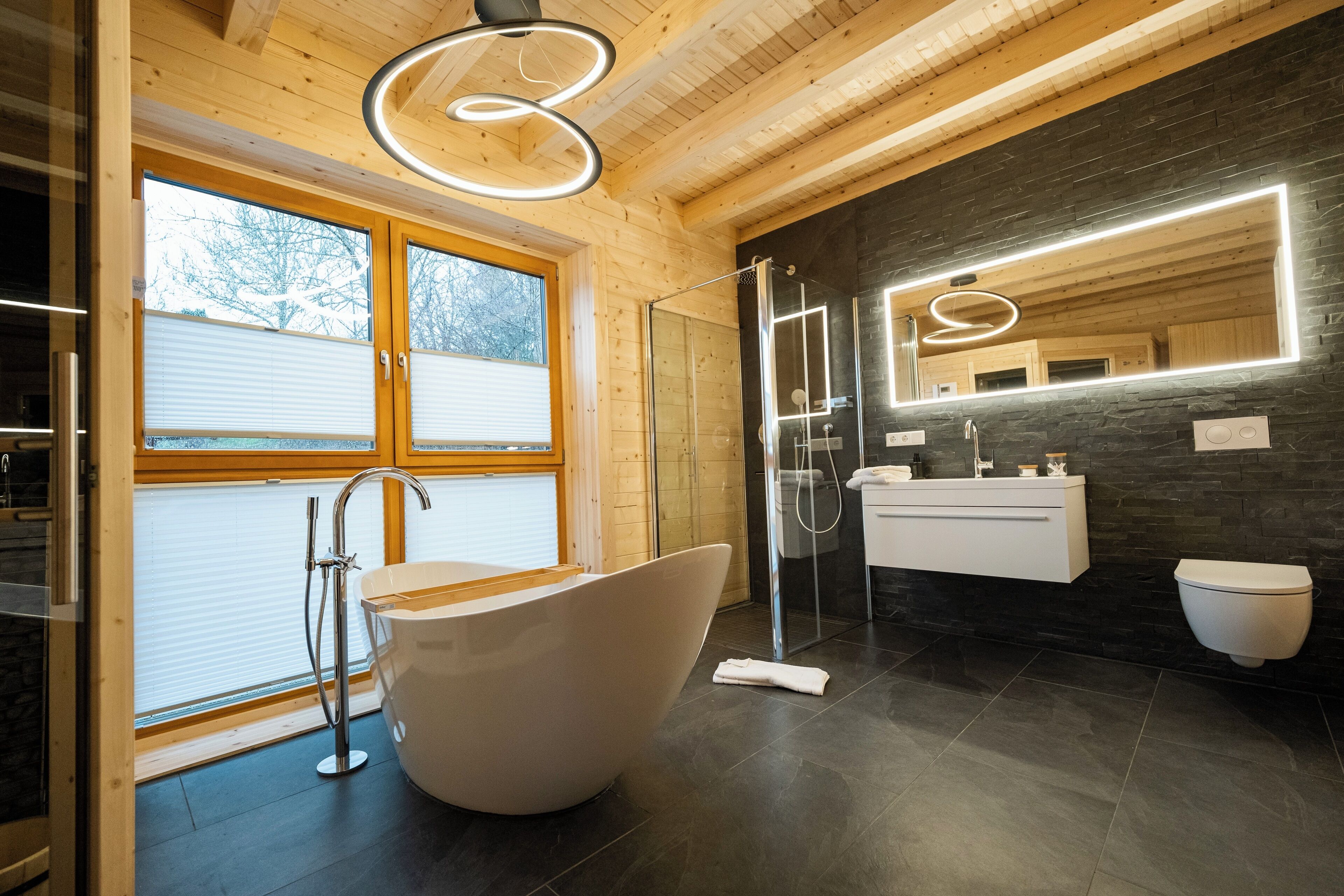 Bathtub, hair dryer, towels, soap