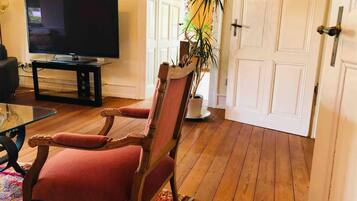 Apartment, Multiple Beds | Living area | Fireplace