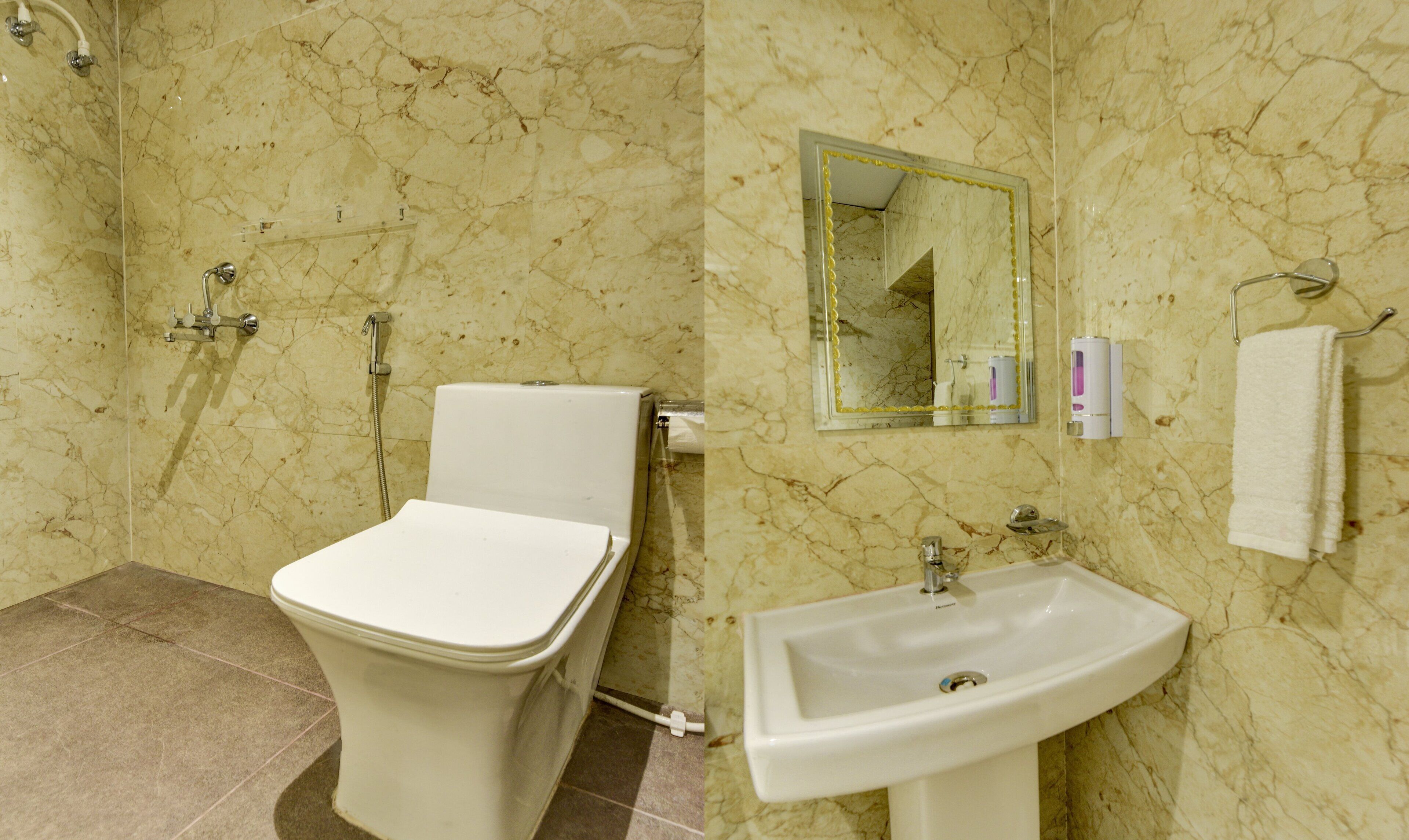 A bathroom with a toilet, shower, sink, and a mirror.