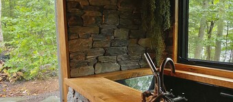 Escape to another world in a renovated 130 y.o. cabin on 850 acres.