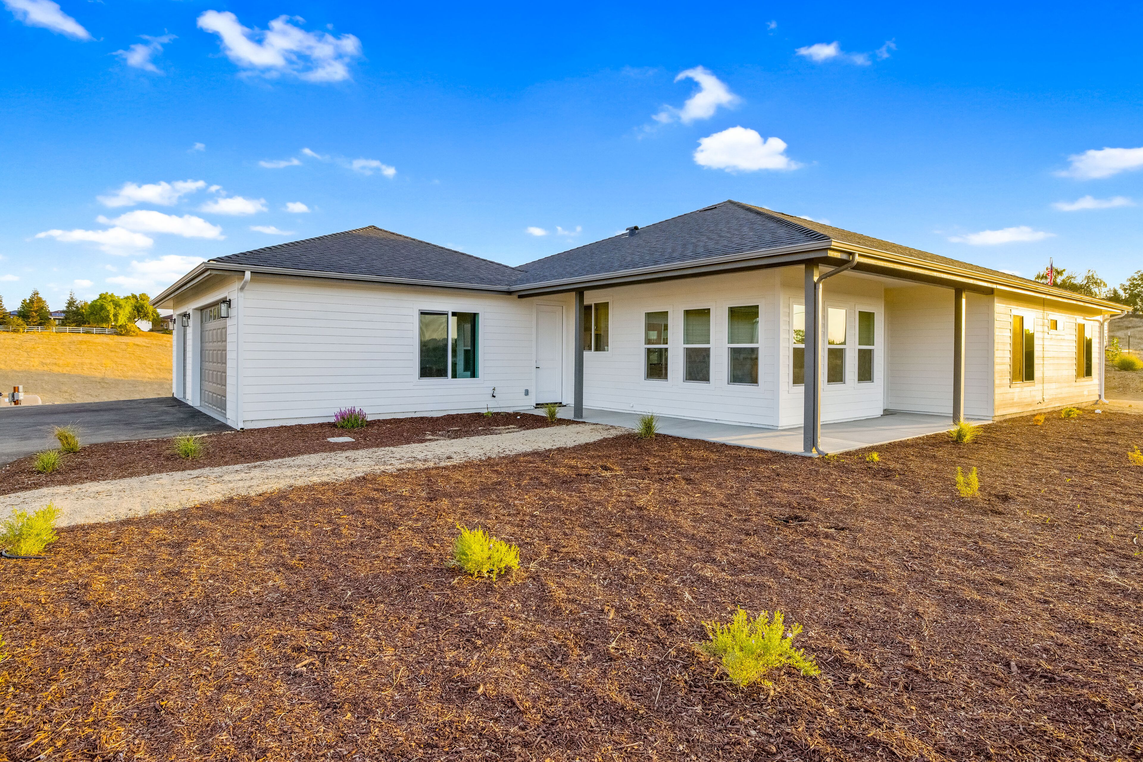 Newly-built, modern farmhouse-style home on two acres with a fireplace