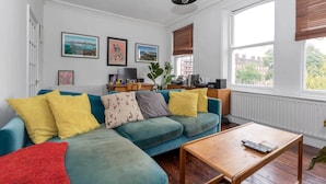 Basic Apartment, Multiple Beds | Living area | TV, fireplace - Bright 2 Bedroom Flat in Lower Clapton (London)