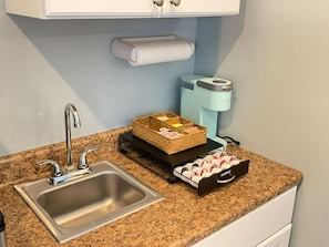 Fridge, microwave, coffee/tea maker, toaster