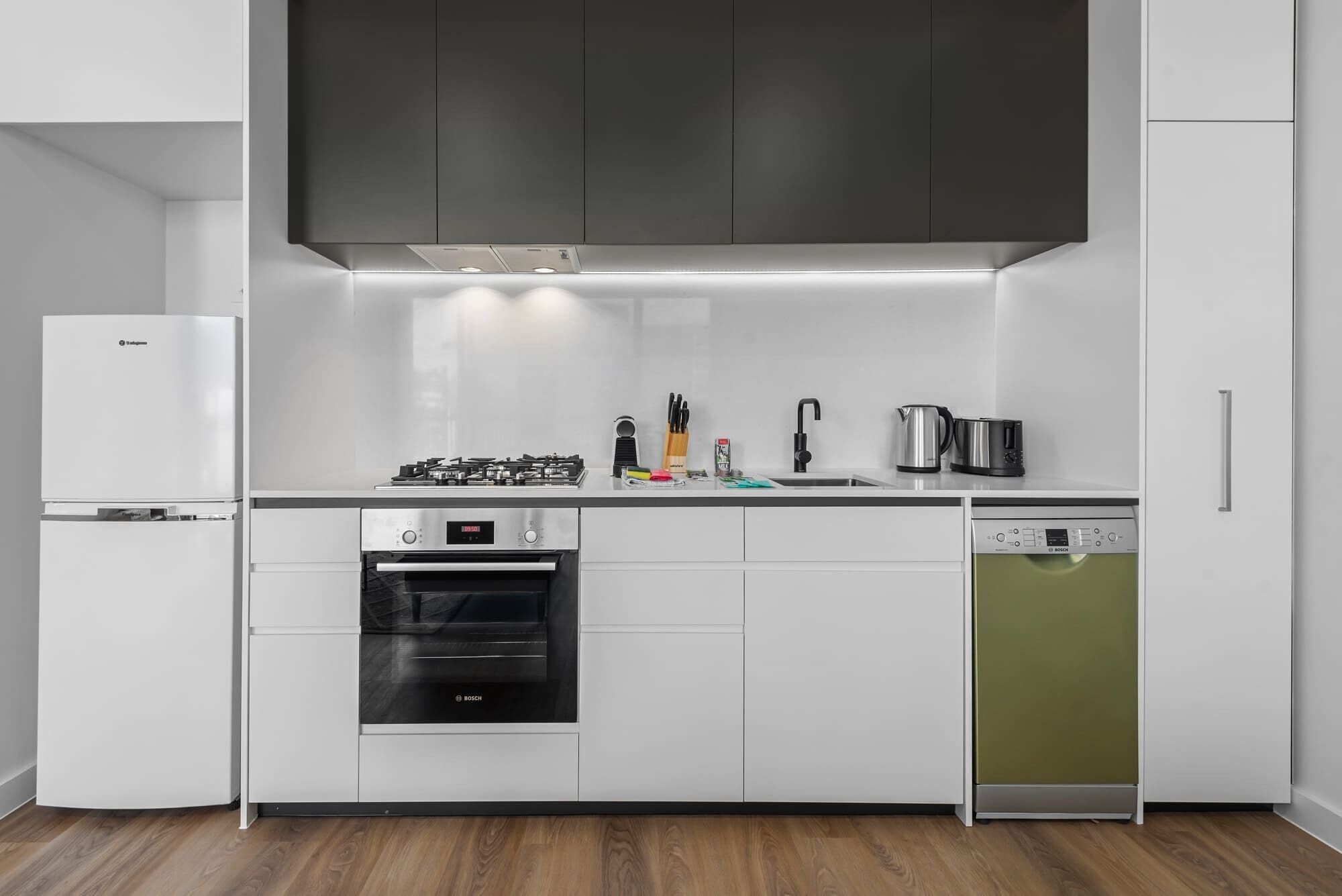 Coffee/tea maker, fridge, microwave, oven