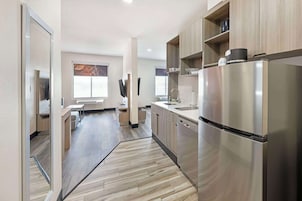 Suite, 1 King Bed, Non Smoking, Kitchen (with Single Sofabed) | Private kitchen | Fridge, microwave