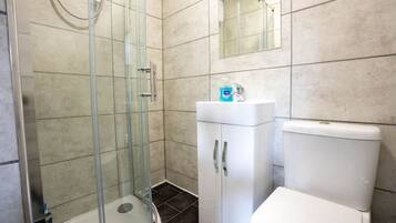 Shower, bidet, towels, soap