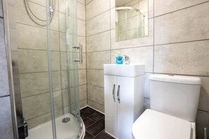 Shower, bidet, towels, soap
