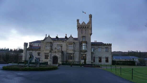 A large, historic building with a prominent tower and a statue in the foreground. - ★ Private & Peaceful | 5 mins to Donegal Town ★ (Donegal Town)