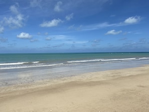 On the beach, white sand