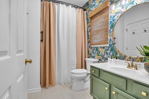 Combined shower/tub, towels, soap, shampoo