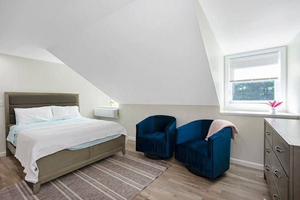 1 bedroom, desk, iron/ironing board, travel crib