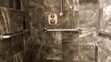 Shower, jetted tub, hair dryer, towels