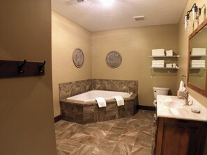 Shower, jetted bath, hair dryer, towels