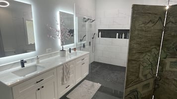 Bathtub, hair dryer, towels, soap