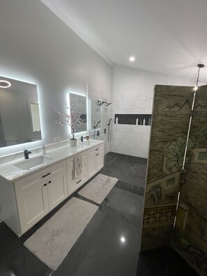 Bathtub, hair dryer, towels, soap