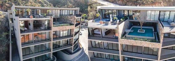 Un edificio moderno a più piani con balconi, una piscina e zone relax all'aperto.