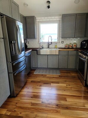 Fridge, microwave, oven, stovetop - Updated beach house with private pool, hot tub, and community fitness center! (Corolla)