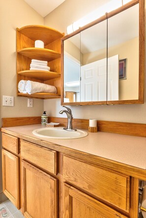 Bathtub, hair dryer, towels, soap
