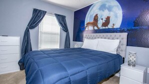 A bedroom with a large bed, a night sky mural, a window with curtains, and a white dresser.
