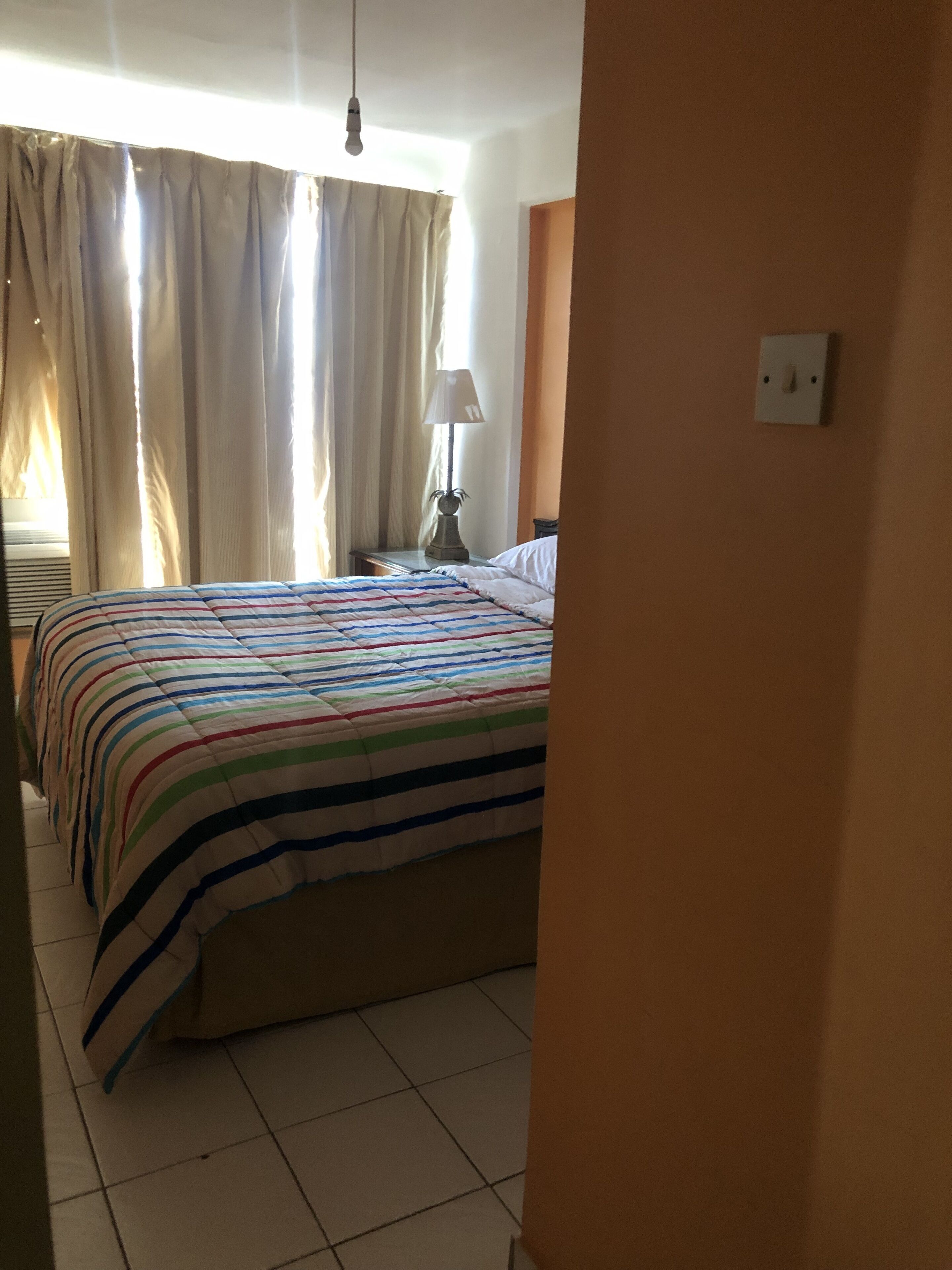 Deluxe Suite | Individually decorated, individually furnished, blackout curtains