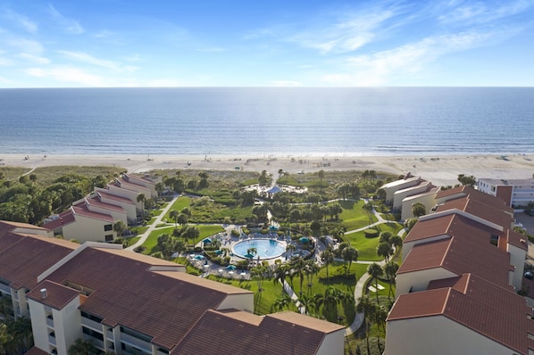 A resort with a pool, beach, and ocean view. - Siesta Dunes 1st Floor Beach Retreat (Siesta Key)