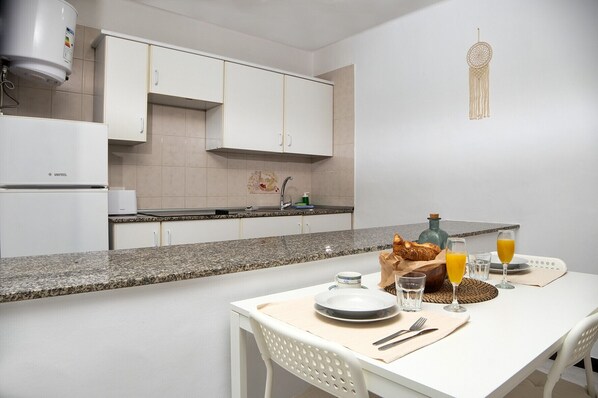 Fridge, microwave, coffee/tea maker, electric kettle