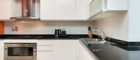 Coffee/tea maker, fridge, microwave, oven