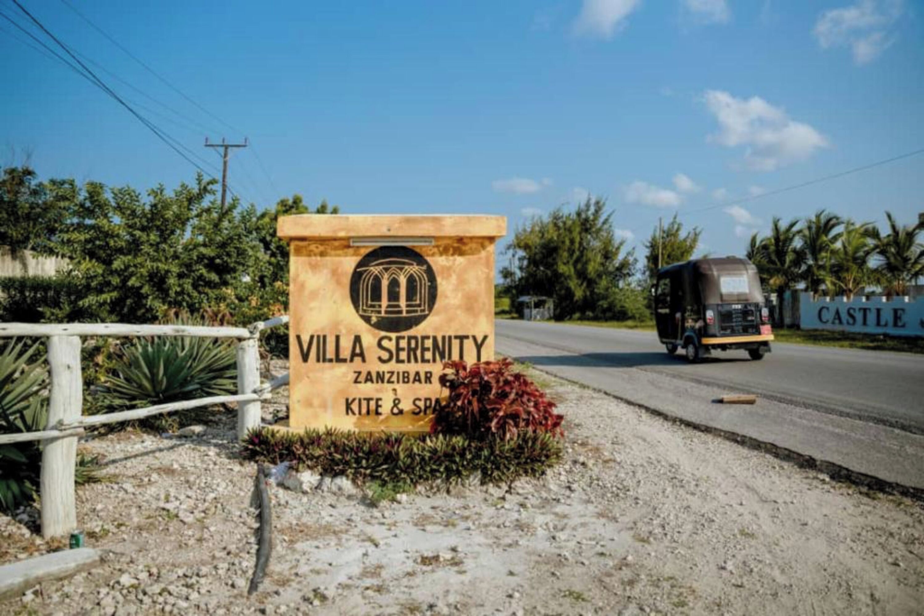 A sign for Villa Serenity in Zanzibar, indicating a hotel or resort.