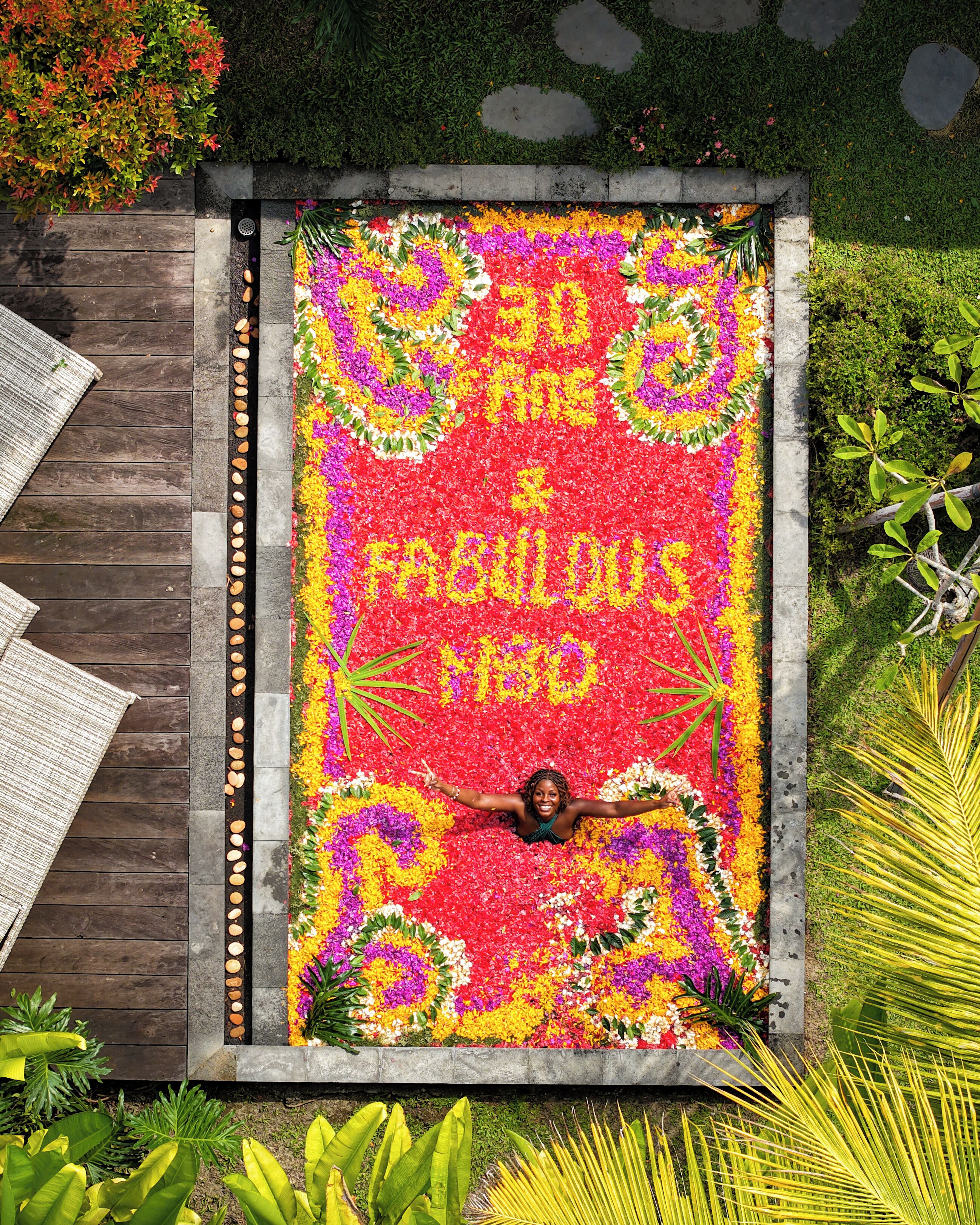 A decorative floral arrangement with a message.