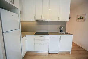 Geladeira, micro-ondas, lava-louças, cafeteira/chaleira