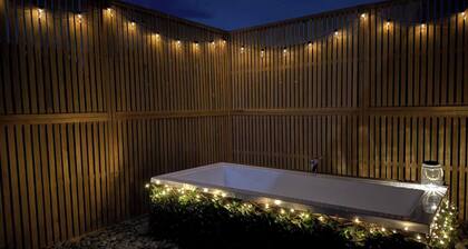 Pods Retreat with friendly farm animals, Pod Retreat, with outdoor bath and farm pets.