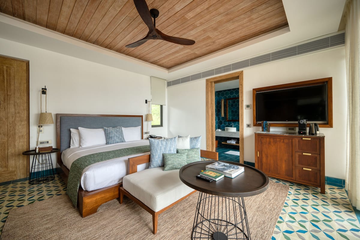Premium bedding, free minibar items, in-room safe