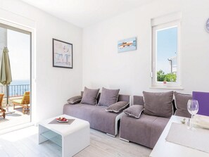 Apartment (Four Bedroom Holiday Home with Swimmi) | Wohnzimmer | Fernseher, Tischfußball