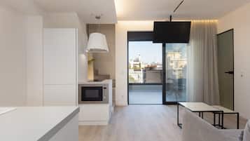 2-Bedroom Maisonette Suite with Jacuzzi | Living area | 43-inch Smart TV with cable channels, TV, Netflix