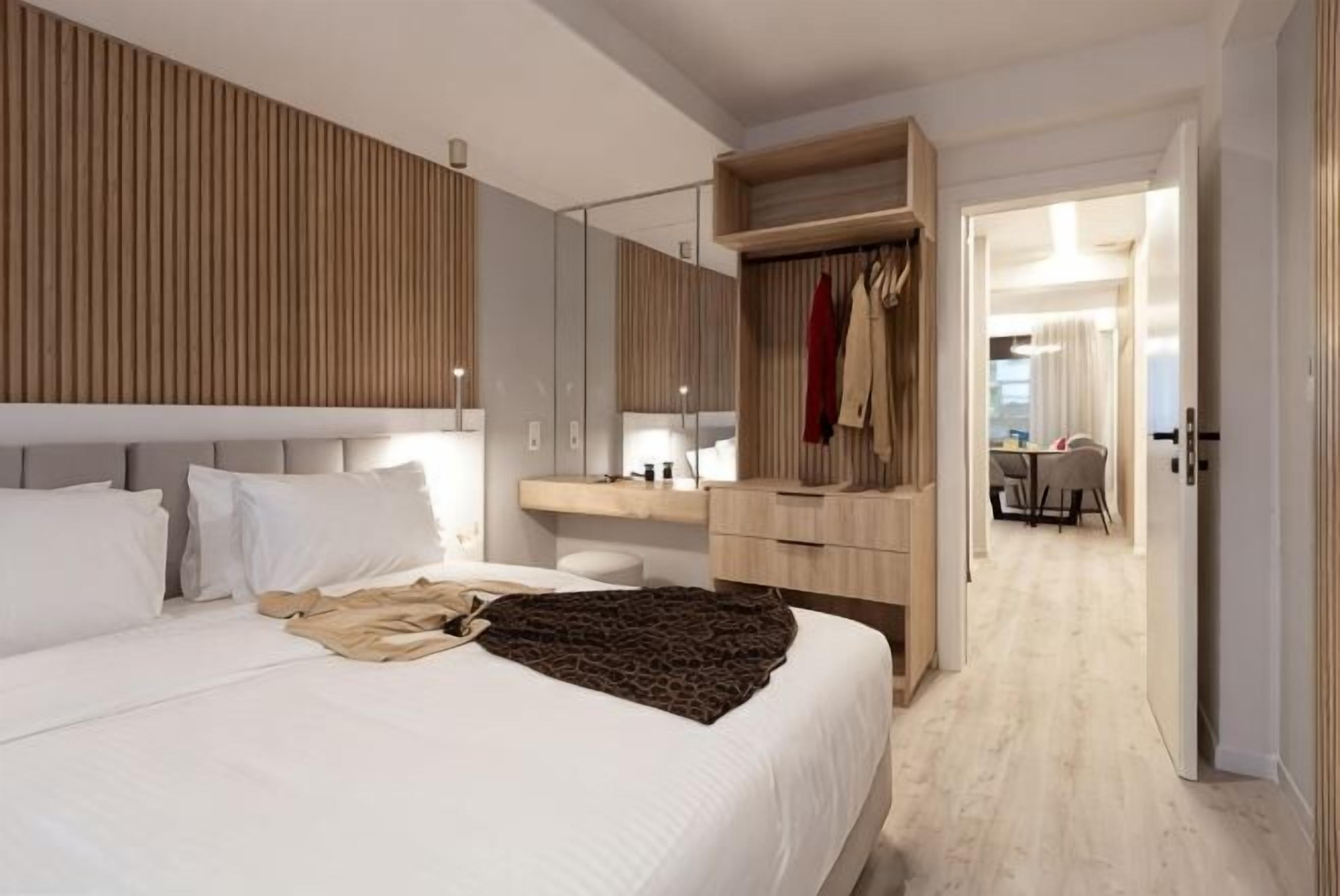 Premium bedding, desk, blackout curtains, iron/ironing board